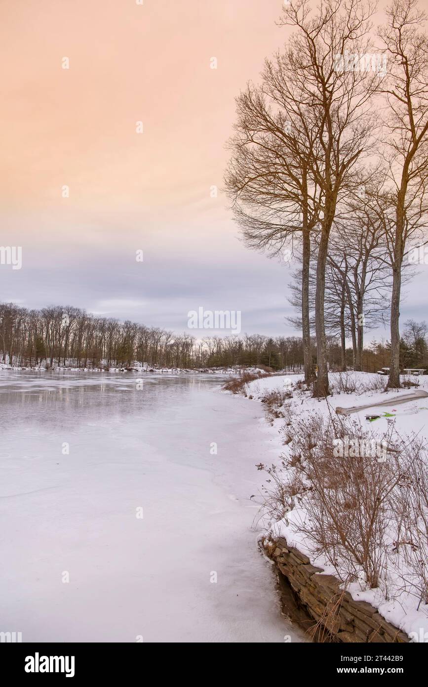 A frozen pond within Beebe hill state forest park in Austerlitz New York on cold winter day