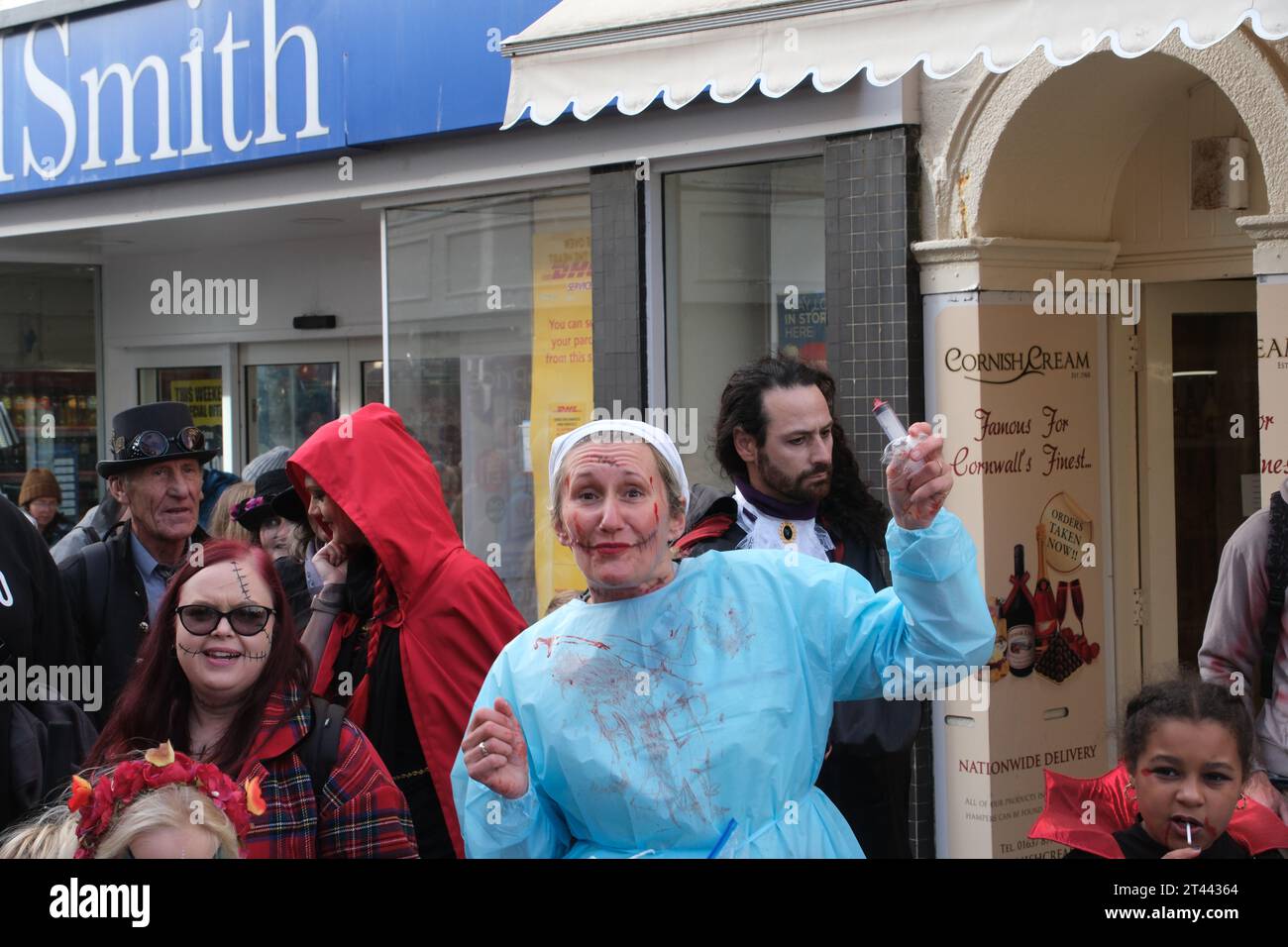 Newquay, Cornwall, UK. 28th October 2023. The annual zombie crawl for halloween took place at Newquay town centre today, with performers and the public donning their best costumes and make up for the day.  Credit Simon Maycock / Alamy Live News. Stock Photo