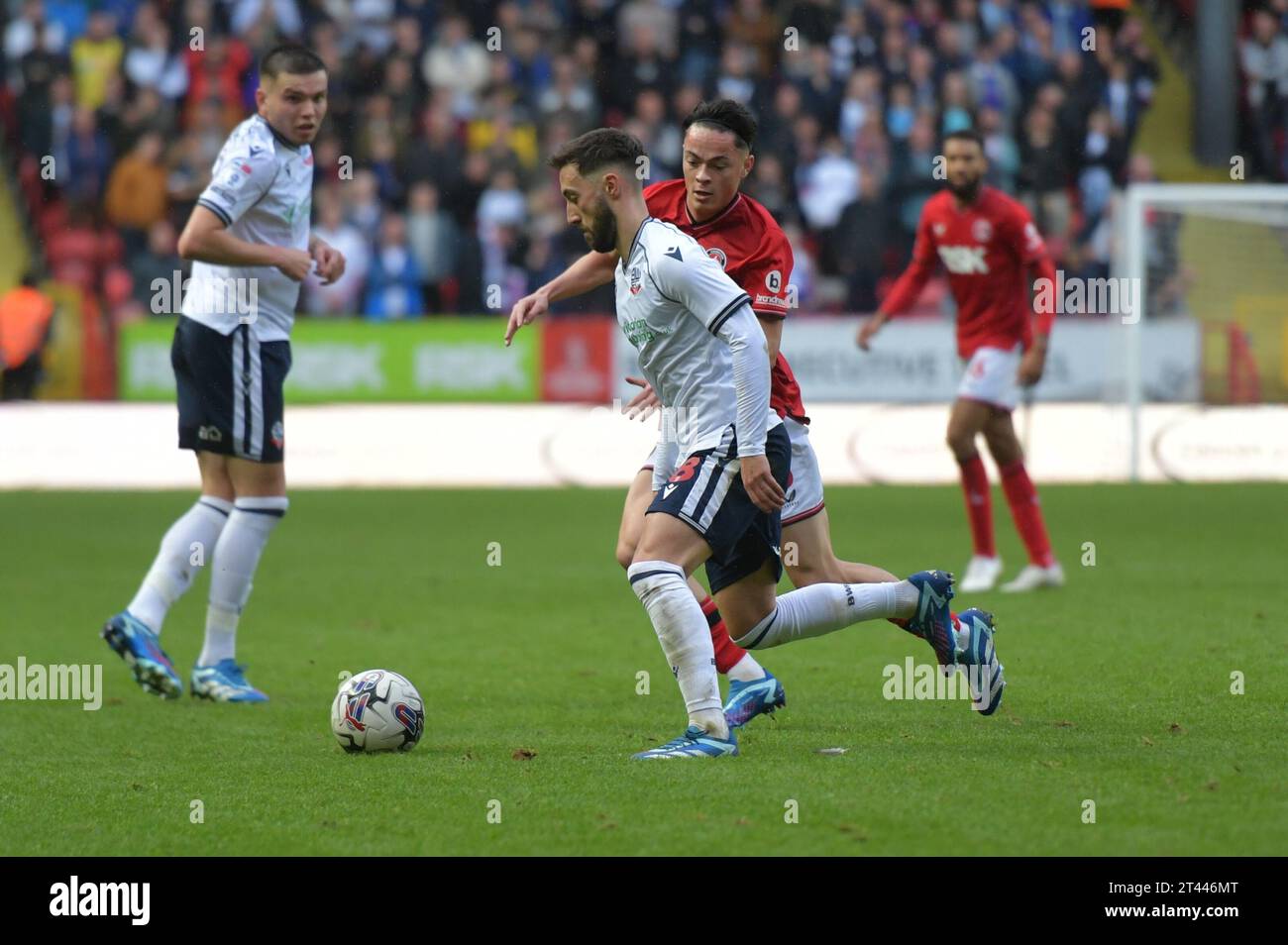 London, England. 28th Oct 2023. Joshua Sheehan of Bolton Wanderers and Louie Watson of Charlton Athletic during the Sky Bet EFL League One fixture between Charlton Athletic and Bolton Wanderers at The Valley. Kyle Andrews/Alamy Live News Stock Photo