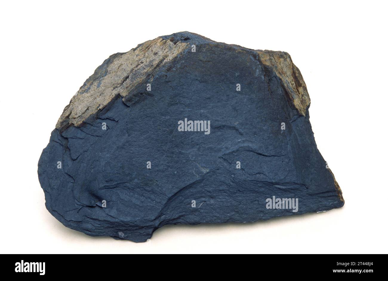 Slate is a foliated metamorphic rock. Sample. Stock Photo