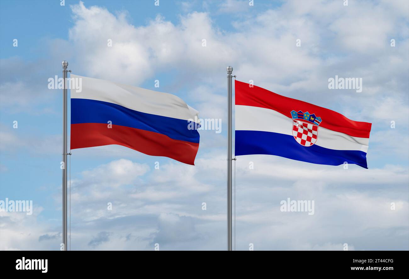 Croatia and Russia flags waving together in the wind on blue cloudy sky ...