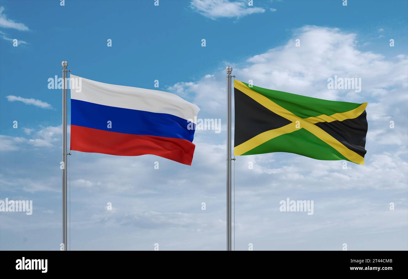 Jamaica and Russia flags waving together in the wind on blue cloudy sky ...