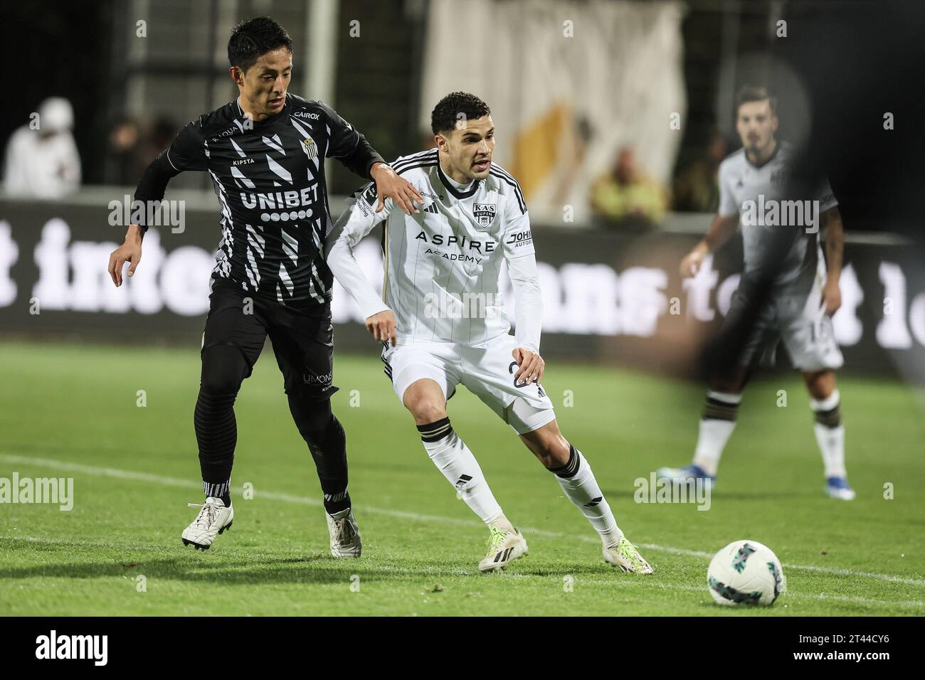 Eupen, Belgium. 28th Oct, 2023. Charleroi's Ryota Morioka and Eupen's Isaac Christie-Davies fight for the ball during a soccer match between KAS Eupen and Sporting Charleroi, Saturday 28 October 2023 in Eupen, on day 12/30 of the 2023-2024 'Jupiler Pro League' first division of the Belgian championship. BELGA PHOTO BRUNO FAHY Credit: Belga News Agency/Alamy Live News Stock Photo