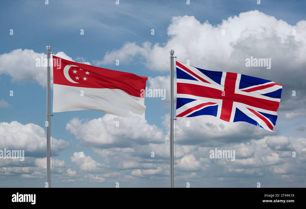 United Kingdom and Singapore flags waving together in the wind on blue cloudy sky, two country relationship concept Stock Photo