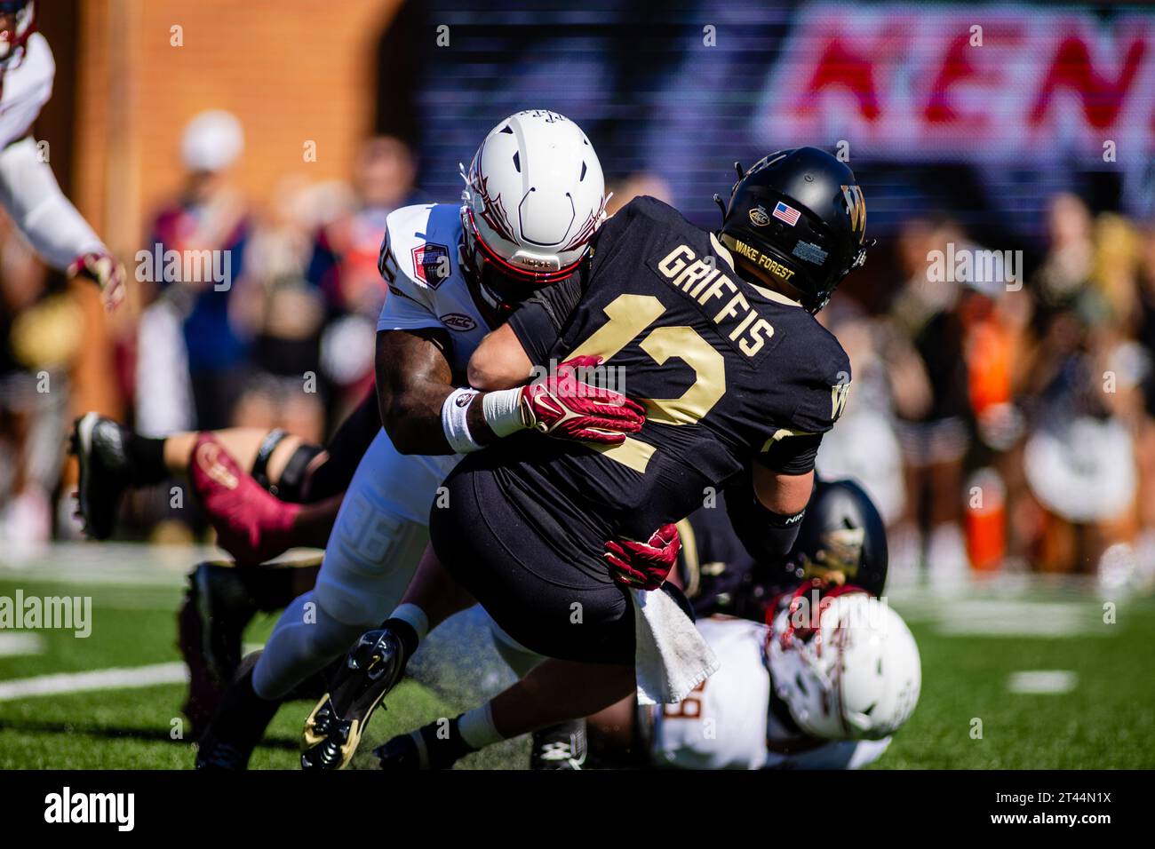 October 28, 2023: Florida State Seminoles linebacker Omar Graham Jr. (36) tackles Wake Forest Demon Deacons quarterback Mitch Griffis (12) during the second quarter of the ACC football match up at Allegacy Stadium in Winston-Salem, NC. (Scott Kinser/CSM) (Credit Image: © Scott Kinser/Cal Sport Media) Stock Photo