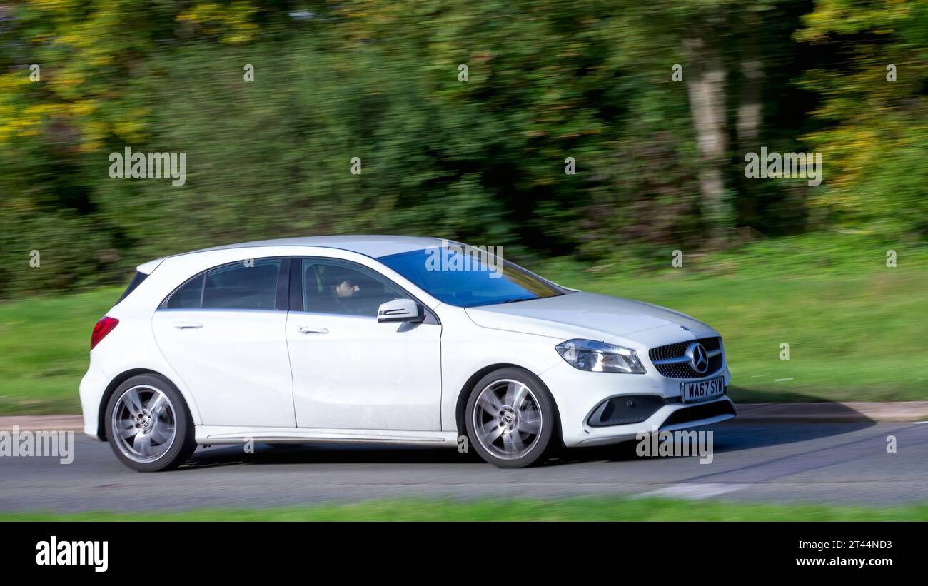 Milton Keynes,UK - Oct 28th 2023:  2017 white diesel engine MERCEDES-BENZ A-CLASS car driving on an English road Stock Photo