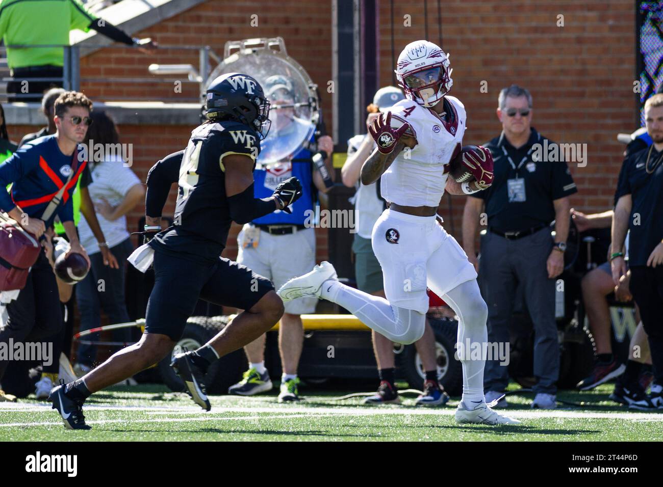 Winston-Salem, NC, USA. 28th Oct, 2023. Florida State Seminoles wide receiver Keon Coleman (4) catches a touchdown pass during the NCAA football game between the Florida State Seminoles and the Wake Forest Demon Deacons at Allegacy Federal Credit Union Stadium in Winston-Salem, NC. Jonathan Huff/CSM/Alamy Live News Stock Photo