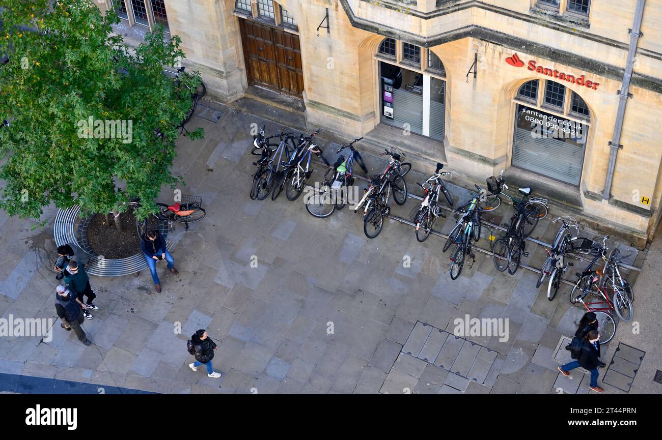 Santander bank with bicycles and pedestrians from above, Oxford, UK Stock Photo