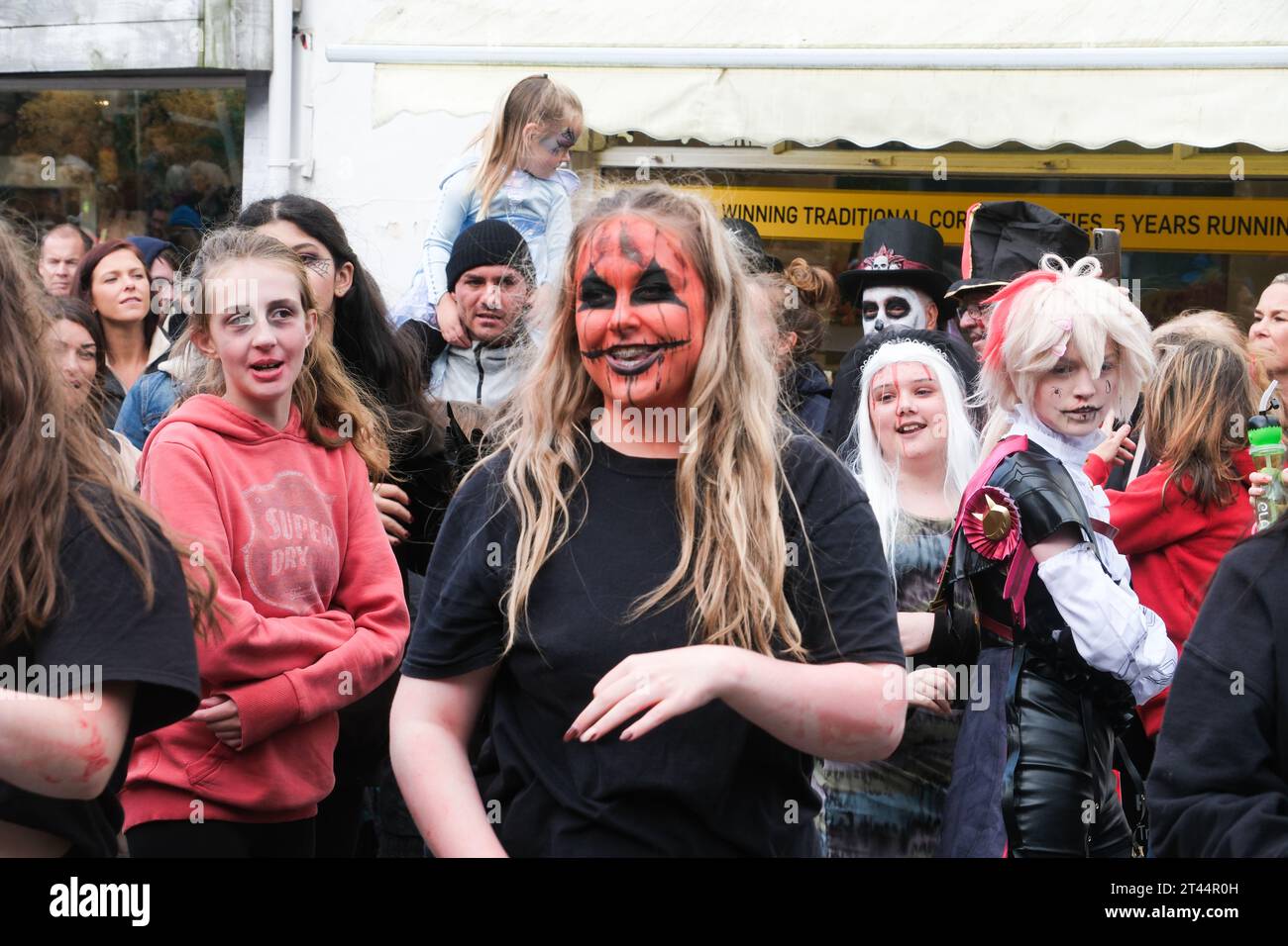 Newquay, Cornwall, UK. 28th October 2023. The annual zombie crawl for halloween took place at Newquay town centre today, starting off from Sainsburies, with performers and the public donning their best costumes and make up for the day.  Credit Simon Maycock / Alamy Live News. Stock Photo