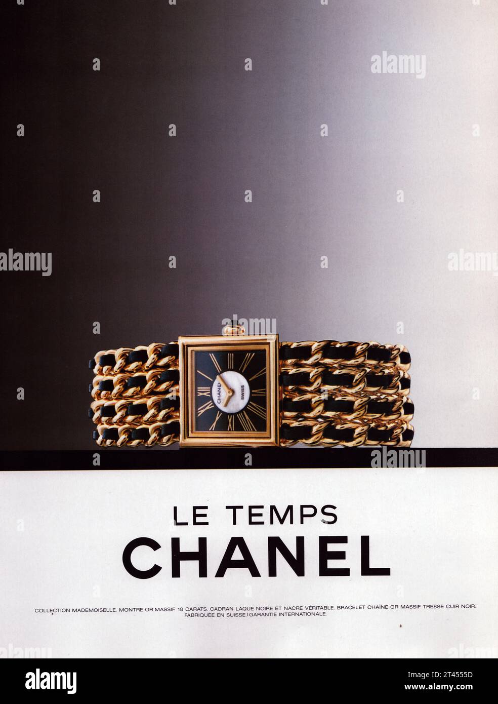 Chanel Le Temps gold watch Chanel black and gold bracelet watch advertisement Chanel ladies watch commercial Stock Photo