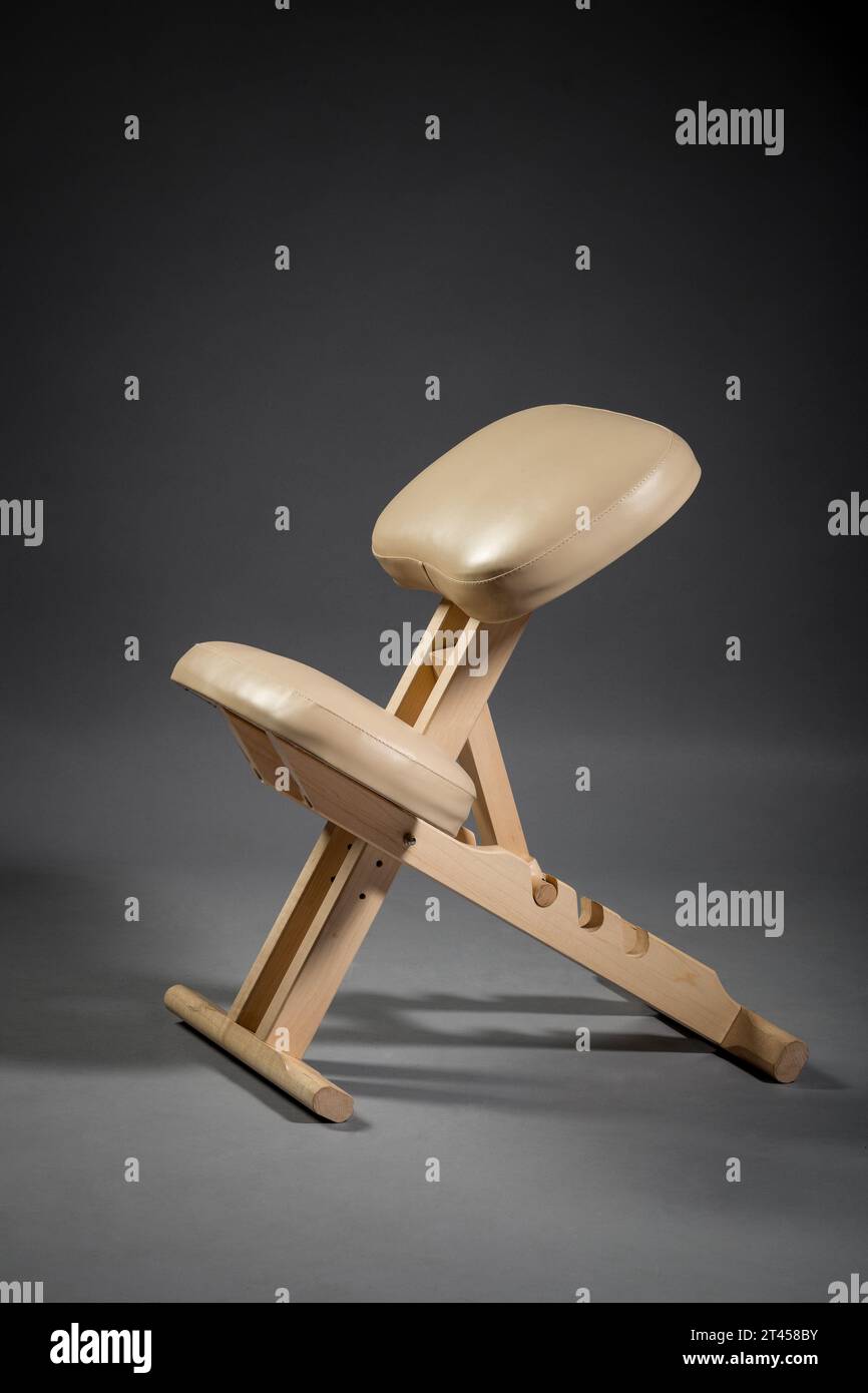 Orthopedic ergonomic chair for correct health posture for office apartment. Health design furniture. Stock Photo