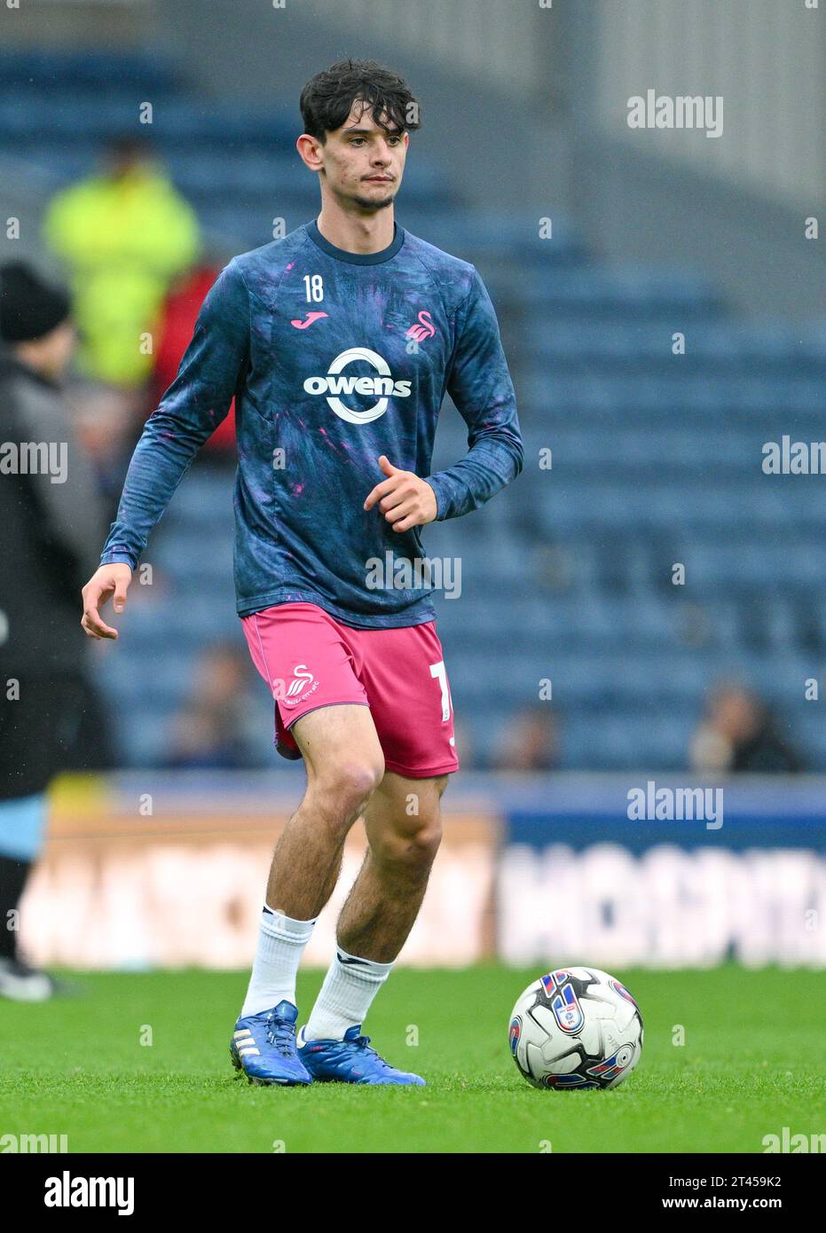 Blackburn, UK. 28th Oct, 2023. Charlie Patino 18# of Swansea City Association Football Club warms up ahead of the match, during the Sky Bet Championship match Blackburn Rovers vs Swansea City at Ewood Park, Blackburn, United Kingdom, 28th October 2023 (Photo by Cody Froggatt/News Images) in Blackburn, United Kingdom on 10/28/2023. (Photo by Cody Froggatt/News Images/Sipa USA) Credit: Sipa USA/Alamy Live News Stock Photo