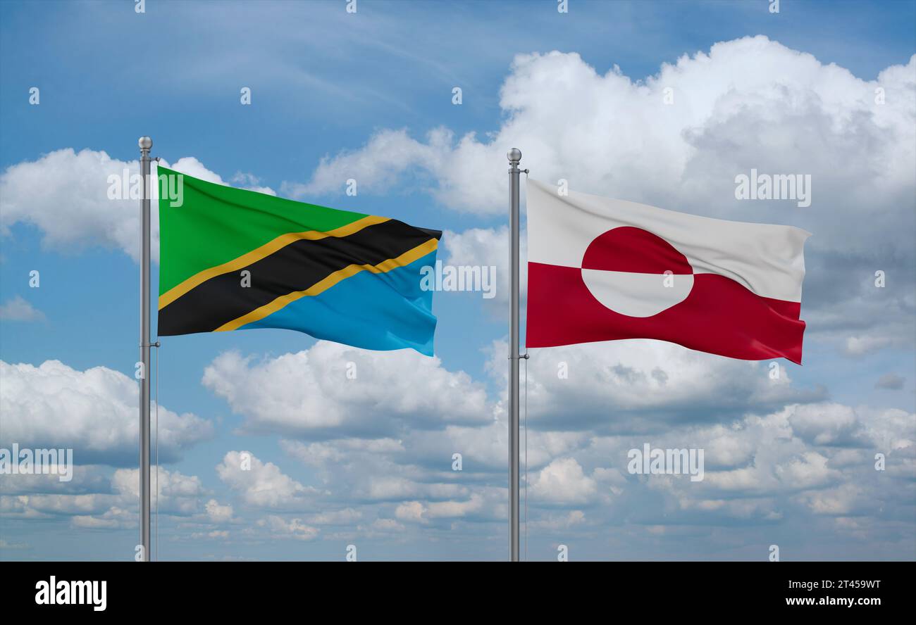 Greenland and Tanzania flags waving together on blue cloudy sky, two ...