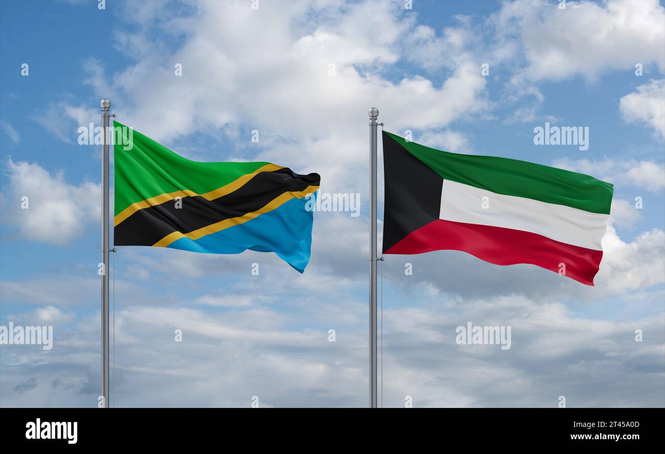 Kuwait and Tanzania flags waving together in the wind on blue cloudy ...