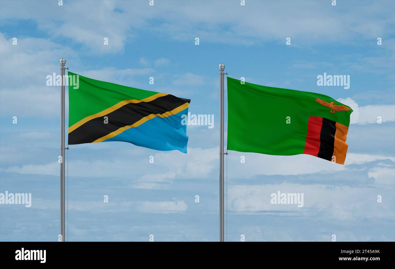 Zambia and Tanzania flags waving together in the wind on blue cloudy ...