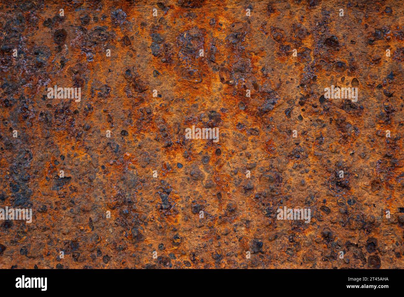 Close-up of an old, weathered and rusty metal surface. High quality and resolution full frame textured grunge rust background. Stock Photo
