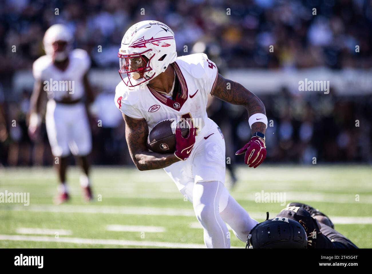 Winston-Salem, NC, USA. 28th Oct, 2023. Florida State Seminoles wide receiver Keon Coleman (4) runs after a reception during the NCAA football game between the Florida State Seminoles and the Wake Forest Demon Deacons at Allegacy Federal Credit Union Stadium in Winston-Salem, NC. Jonathan Huff/CSM/Alamy Live News Stock Photo