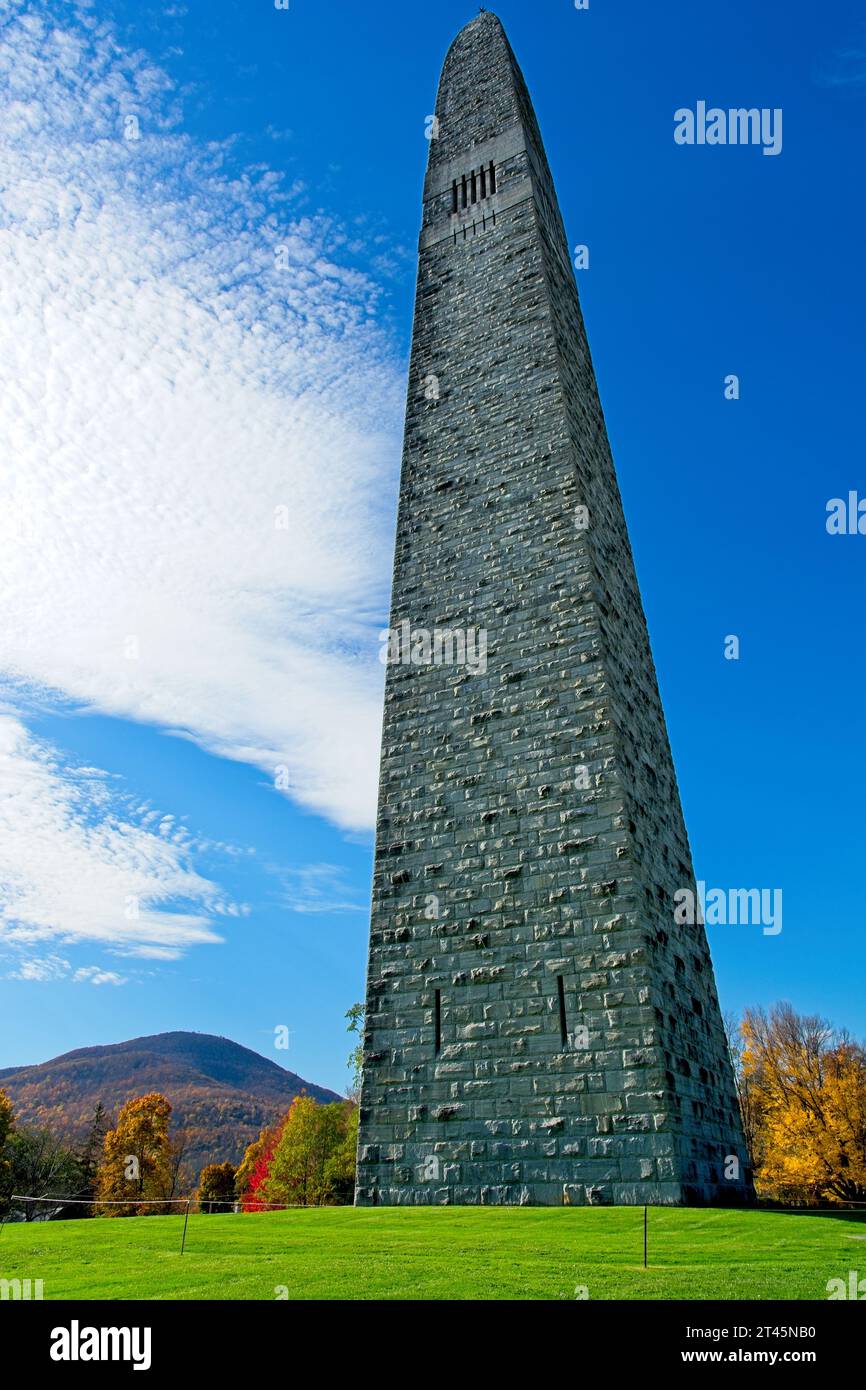 93 meter limestone obelisk commemorating American Revolutionary War Battle of Bennington bright autumn colored trees, distant Taconic mountains Stock Photo