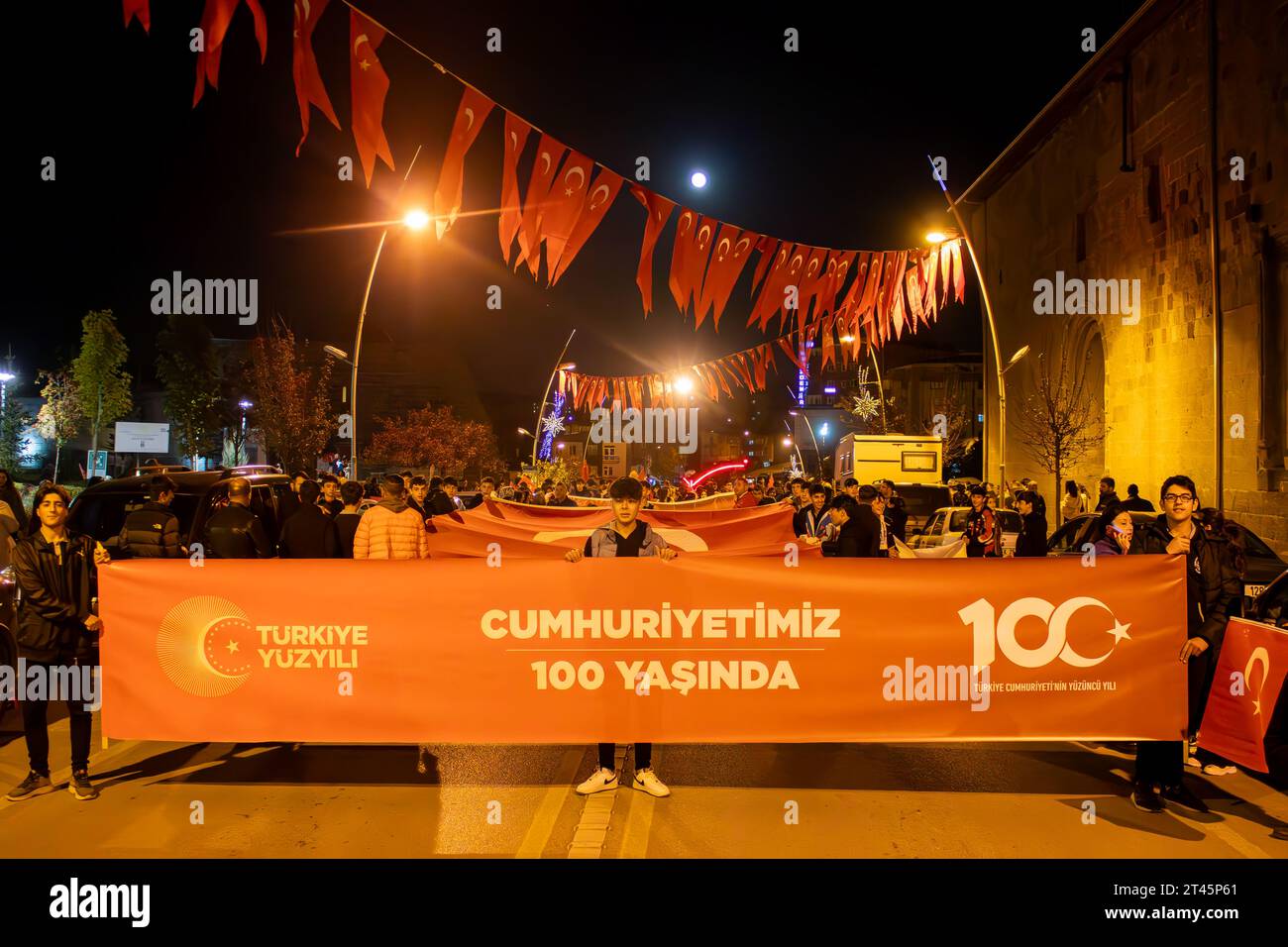 100th Anniversary of the Republic or Cumhuriyetin 100. Yili , March with Turkish Flags. Torchlight Procession. Erzurum, Turkey - October 28, 2023 Stock Photo