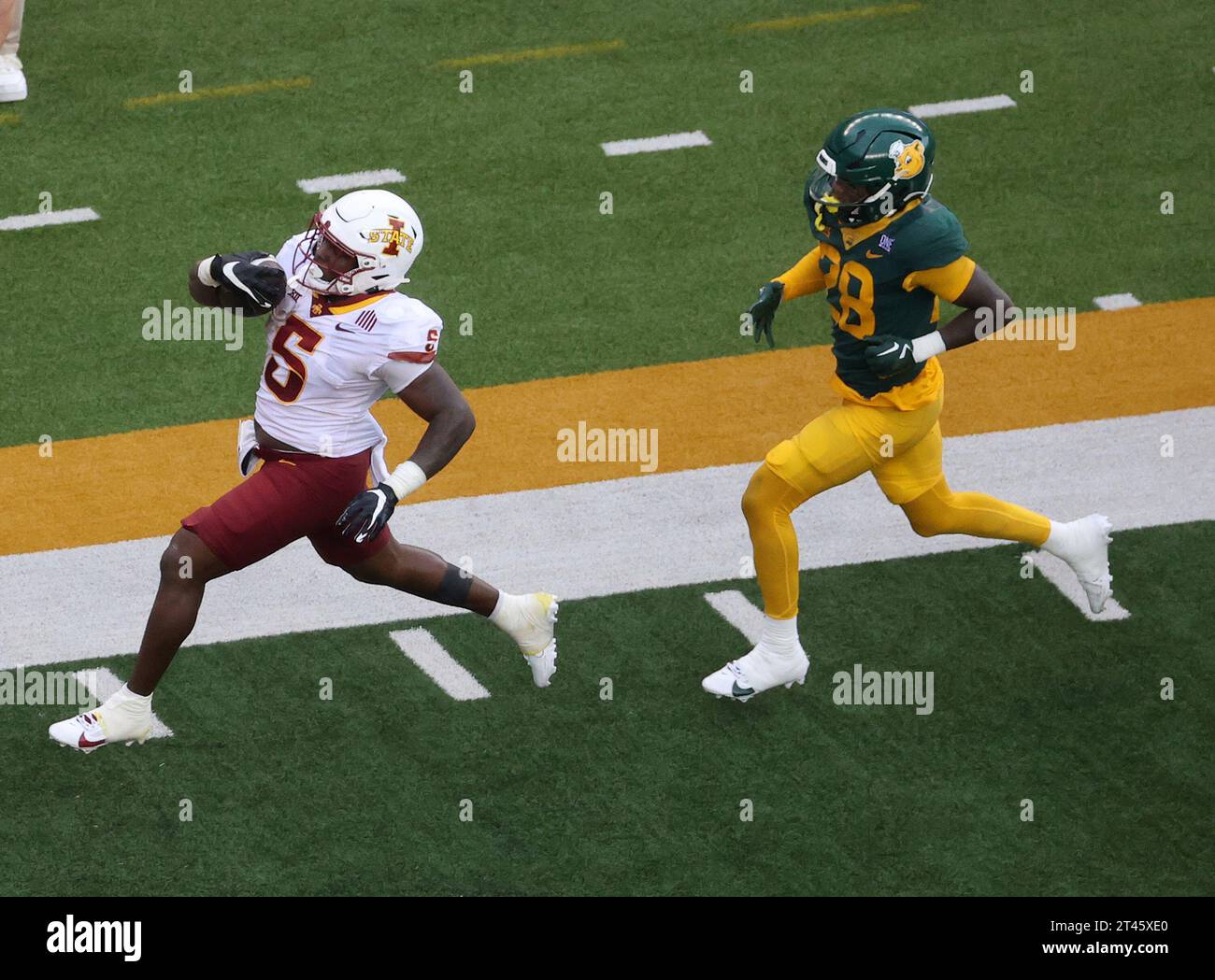 Iowa State running back Cartevious Norton (5) scores a touch down past Baylor safety Devyn Bobby