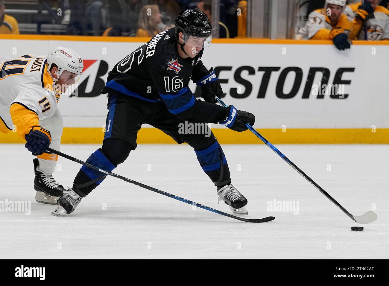 Toronto Maple Leafs right wing Mitchell Marner (16) skates the puck ...