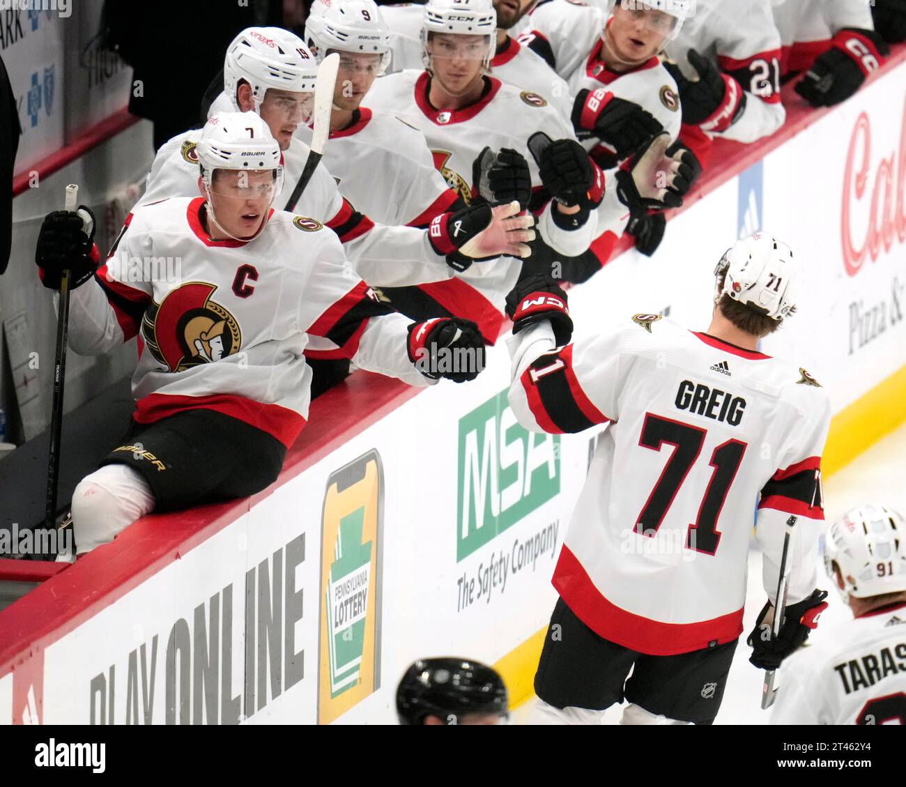 Ottawa Senators' Ridly Greig (71) returns to the bench after scoring ...
