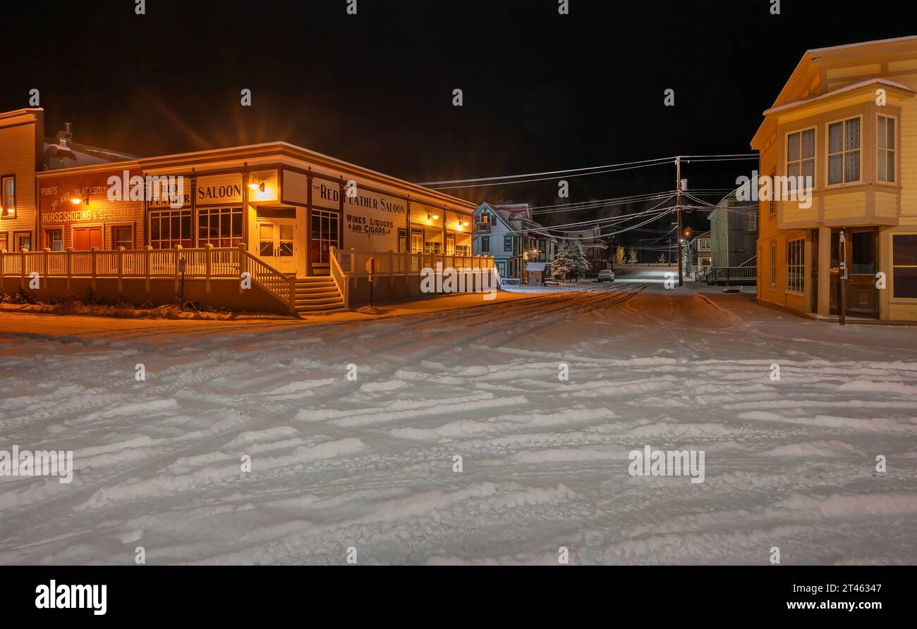 Dawson City, Yukon, Canada – October 06, 2023:  Winter night view of the historic Red Feather Saloon Stock Photo