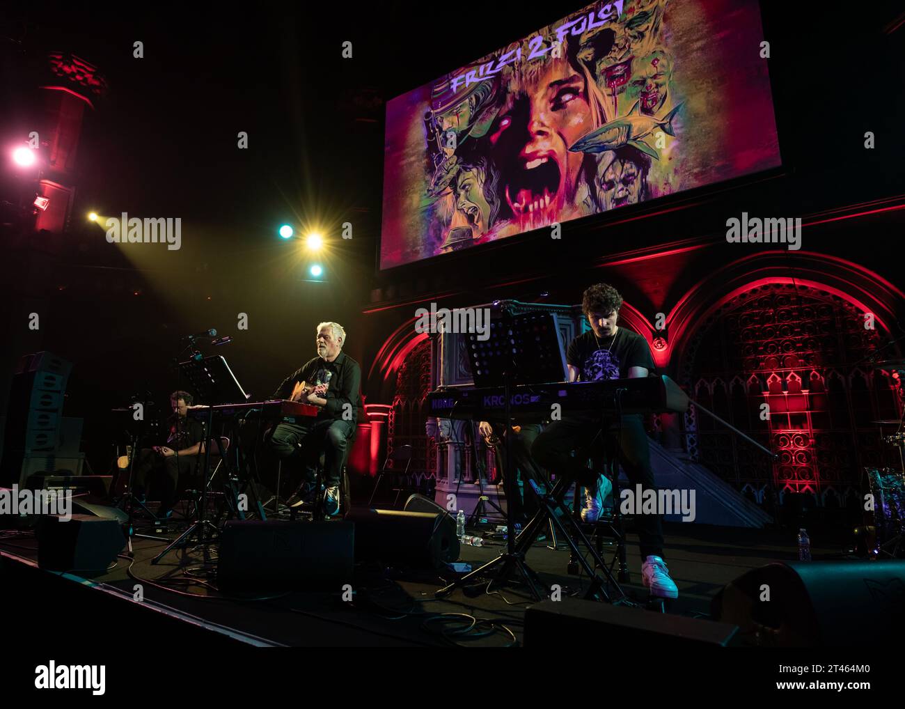 London, United Kingdom. 28th October 2023. Italian composer Fabio Frizzi and his band play the score for classic italian horror Zombie Flesh Eaters live at Union Chapel, for the 2023 Halloween edition of Frizzi2Fulci . Cristina Massei/Alamy Live News Stock Photo