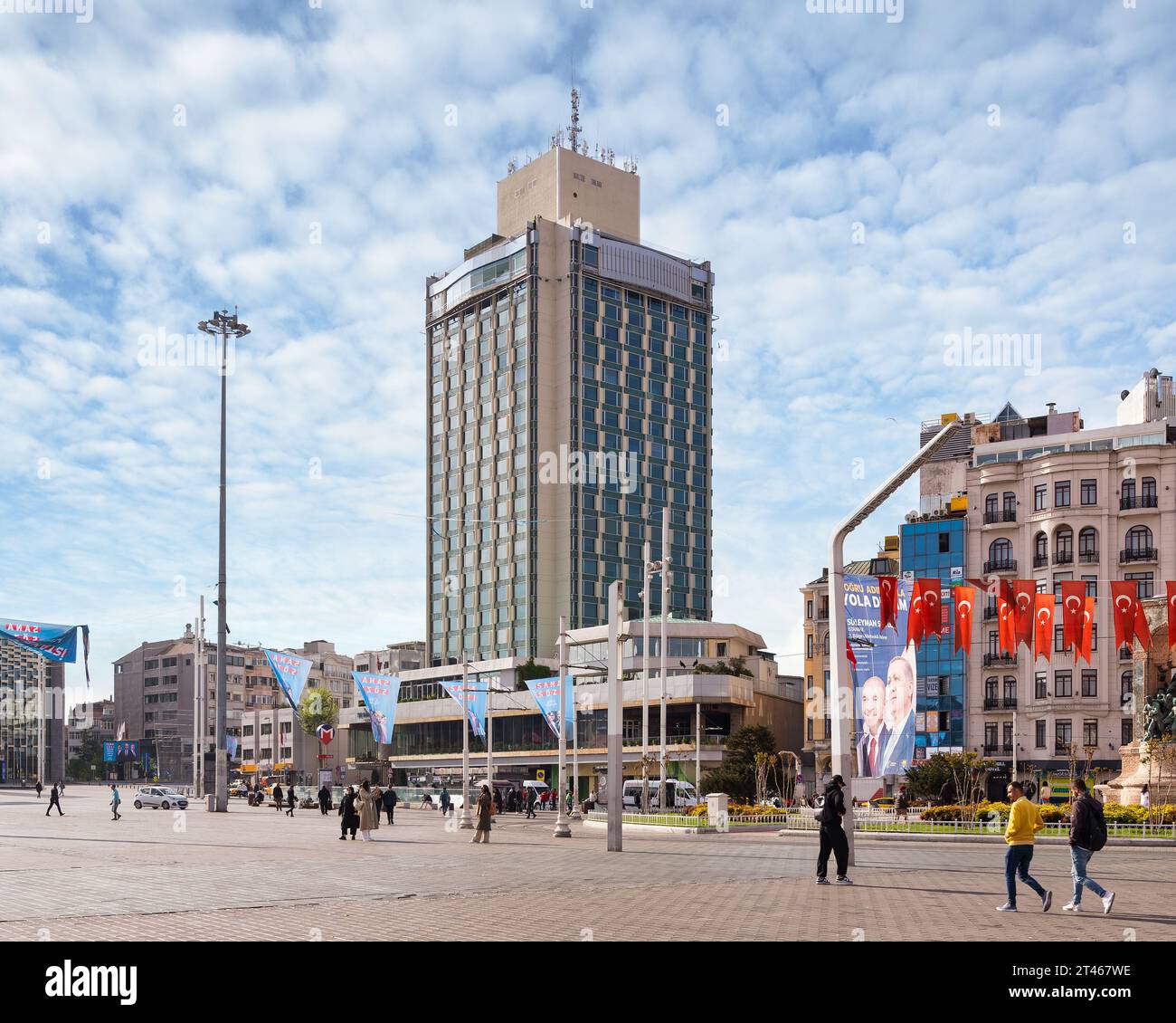 Istanbul, Turkey - May 13, 2023: Exterior of modern architectural design tall building of five stars Marmara hotel, located at Taksim Square, or Taksim Meydani in a spring day Stock Photo
