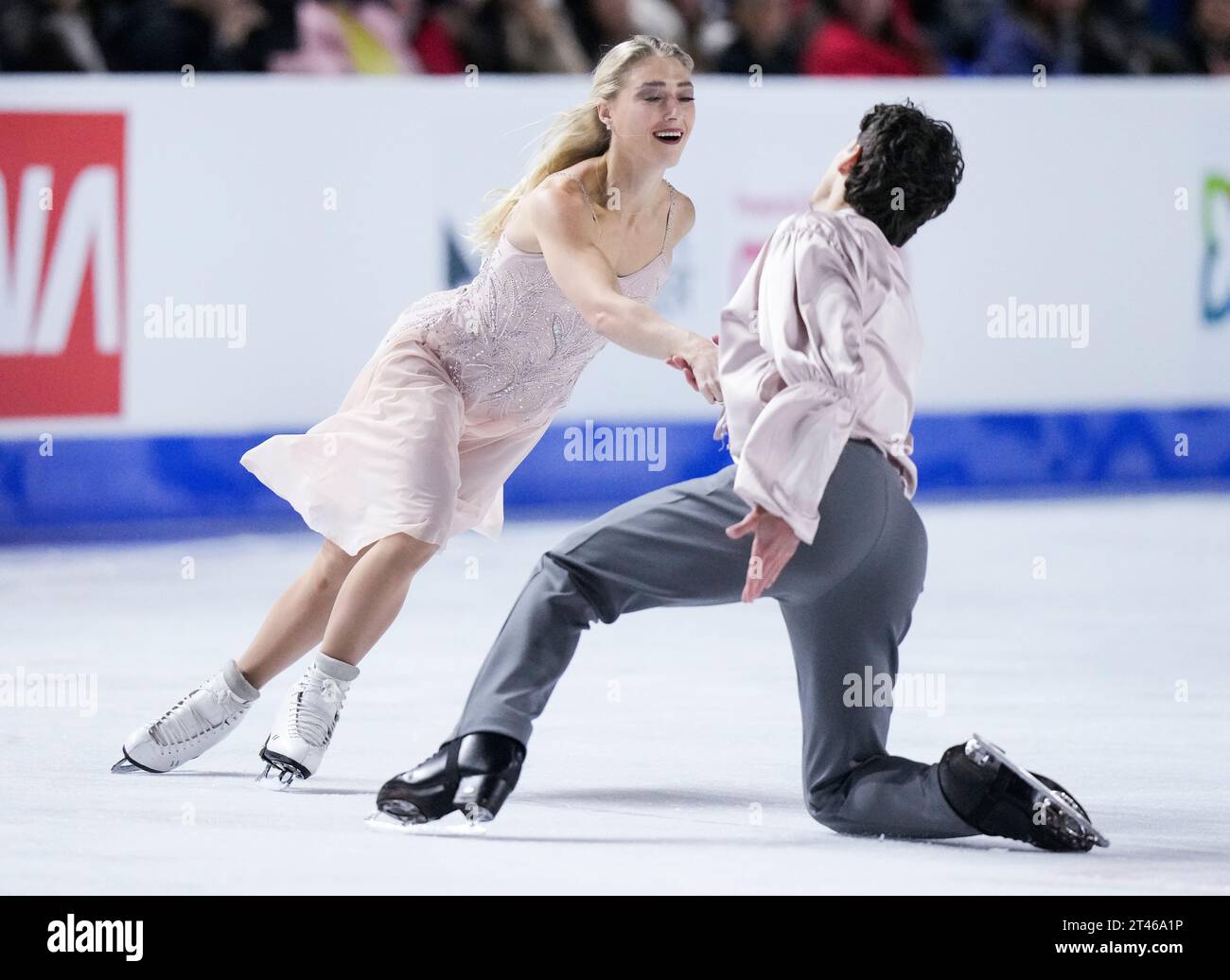 Piper Gilles and Paul Poirier of Canada skate during the ice dance free