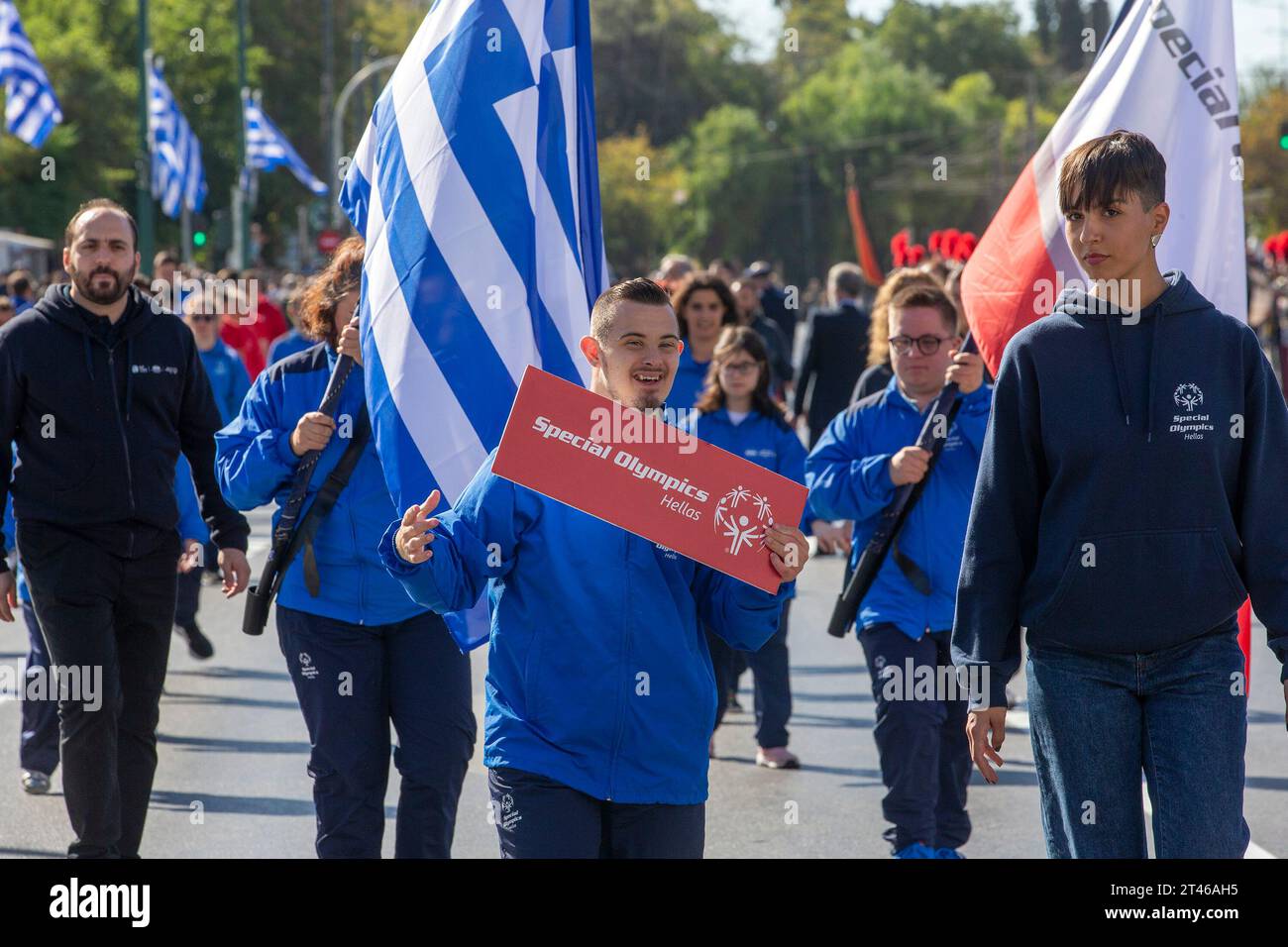 Athens, Greece. 28th Oct, 2023. Members of the Greek Special Olympics team attend a national 'Ochi (No) Day' parade in Athens, Greece, Oct. 28, 2023. 'Ochi' was the response given on Oct. 28, 1940, by the then head of the Greek government to Italy's ultimatum to surrender the country to the Axis forces. It marked Greece's entry in World War Two. Credit: Marios Lolos/Xinhua/Alamy Live News Stock Photo