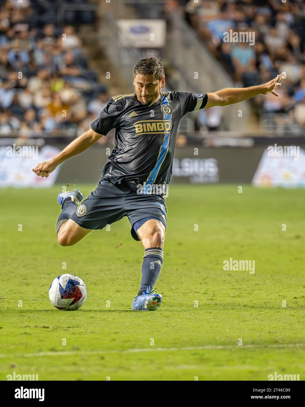 Alejandro Bedoya shoots the ball during an MLS match versus the New England Revolution - Major League Soccer footballers playing on the pitch in the USA / United States Credit: Don Mennig / Alamy News Stock Photo