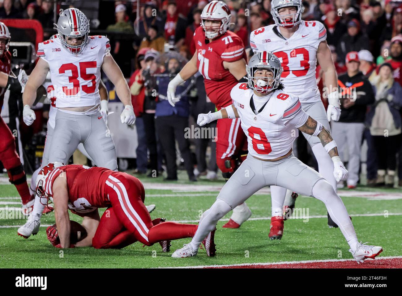 Madison, Wisconsin, USA. 28th Oct, 2023. Ohio State Buckeyes safety Lathan Ransom (8) celebrates his tackle for a loss during the game between the Ohio State Buckeyes and Wisconsin Badgers at Camp Randall Stadium, Madison, Wisconsin (Credit Image: © Scott Stuart/ZUMA Press Wire) EDITORIAL USAGE ONLY! Not for Commercial USAGE! Stock Photo