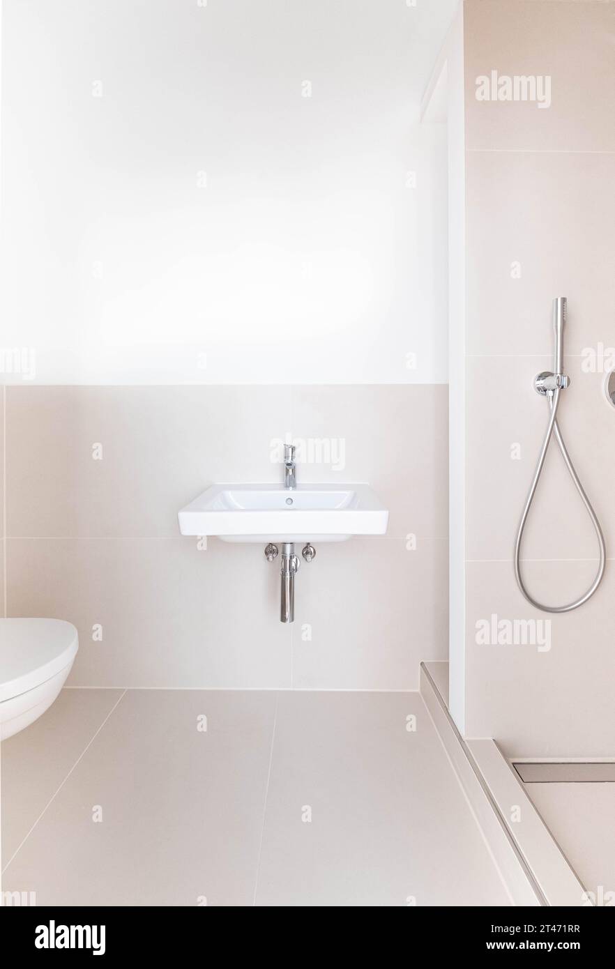 modern new bathroom with shower after renovation Stock Photo