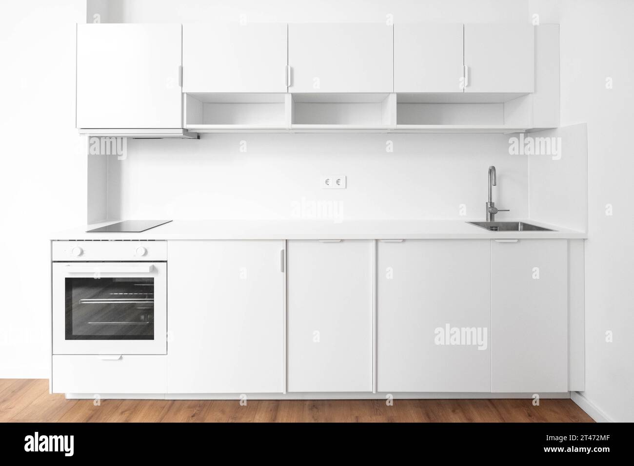 build in kitchen or kitchenette in new apartment room Stock Photo