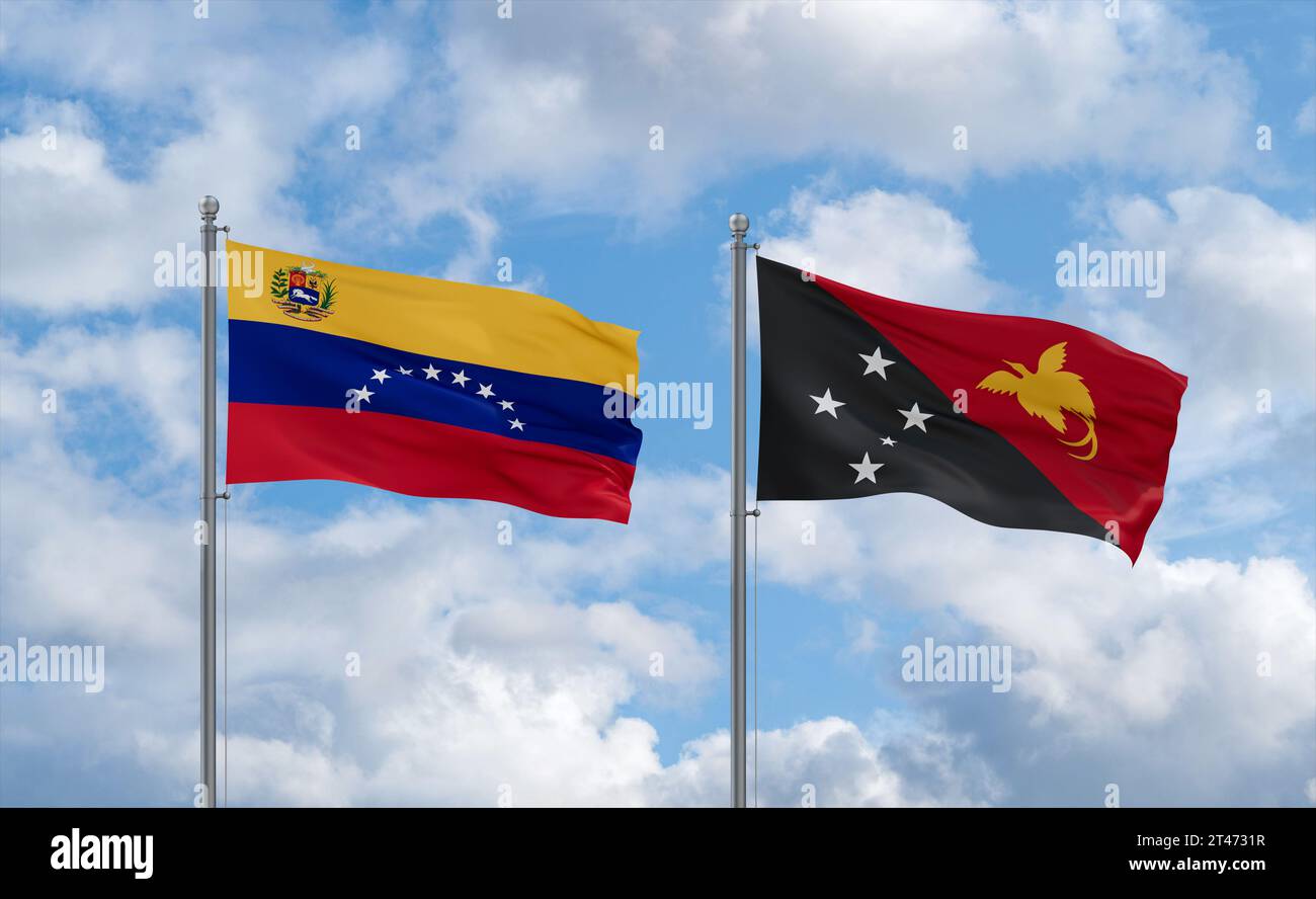 Papua New Guinea and Venezuela flags waving together on blue cloudy sky ...