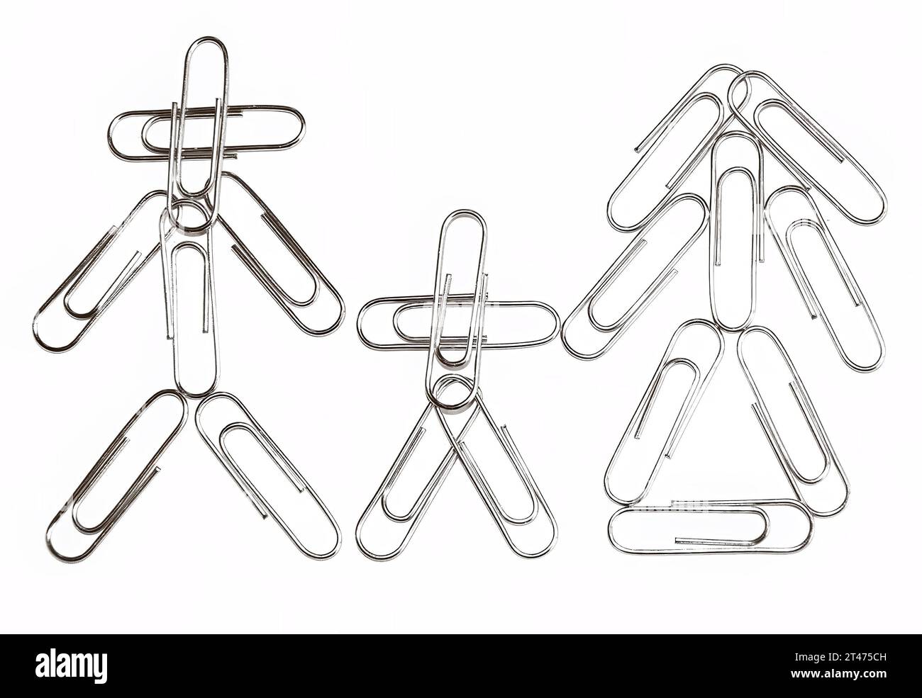 Paperclips arranged in the form of a family, isolated over white