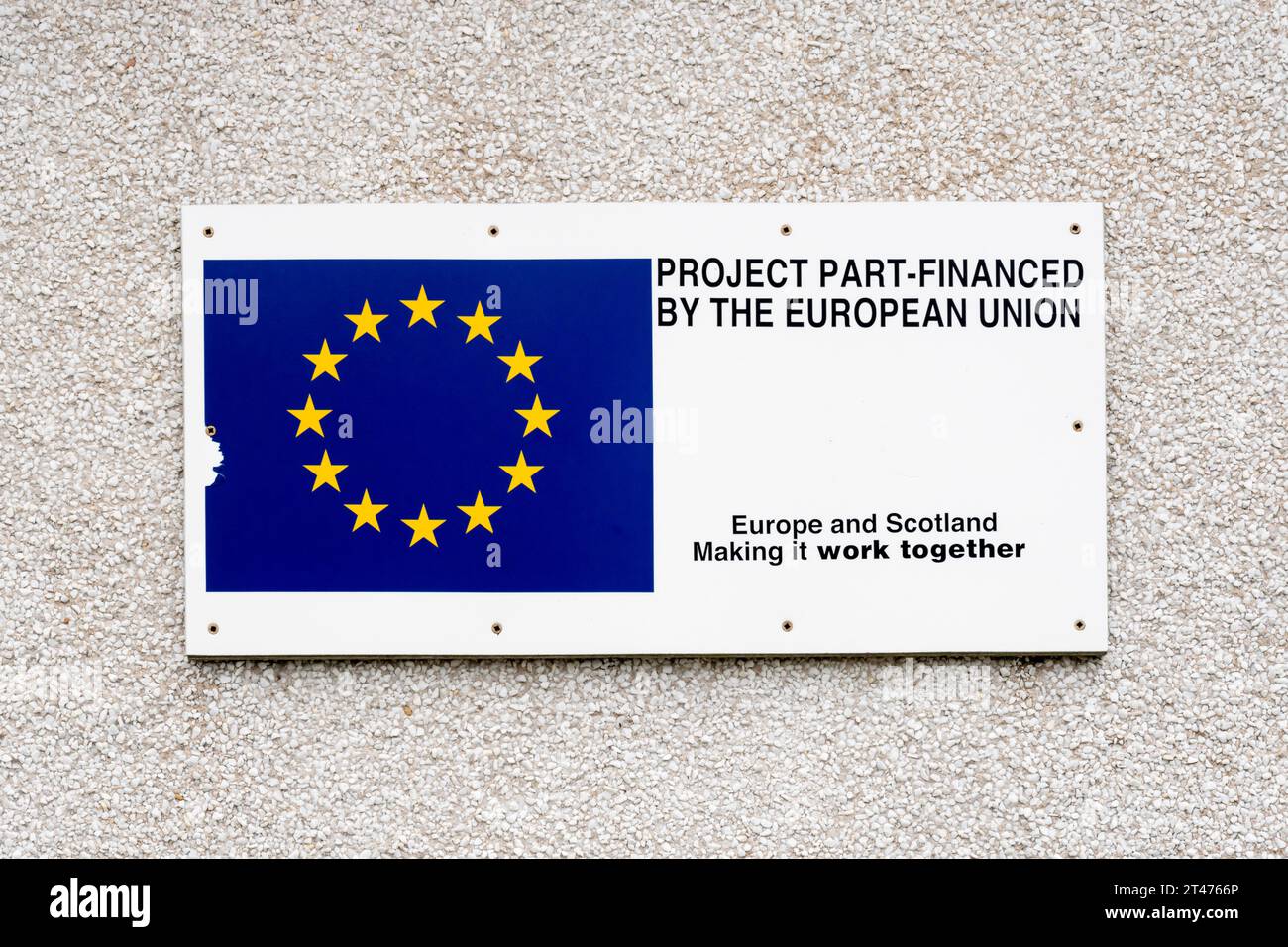 Gratitude plaque sign reading Project Part-Financed by the EU, Europe & Scotland Making It Work Together on Fetlar pier in Shetland. Stock Photo