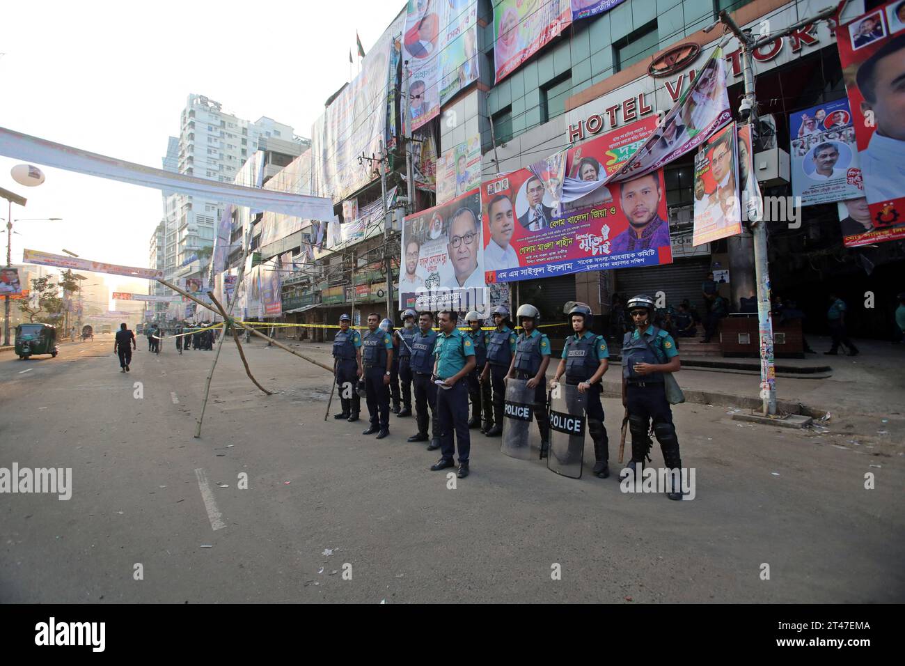 Bangladesh's Criminal Investigation Department (CID) unit gather along a street as they inspect a protest site after Bangladesh Nationalist party (BNP) activists held a rally amid the ongoing nationwide strike in Dhaka on October 29, 2023. More than 100,000 supporters of two major Bangladesh opposition parties rallied on October 28, to demand Prime Minister Sheikh Hasina step down to allow a free and fair vote under a neutral government. Both BNP and Jamaat-e-Islami called for a nationwide strike on October 29, 2023, to protest the violence. Photo by Habibur Rahman/ABACAPRESS.COM Stock Photo