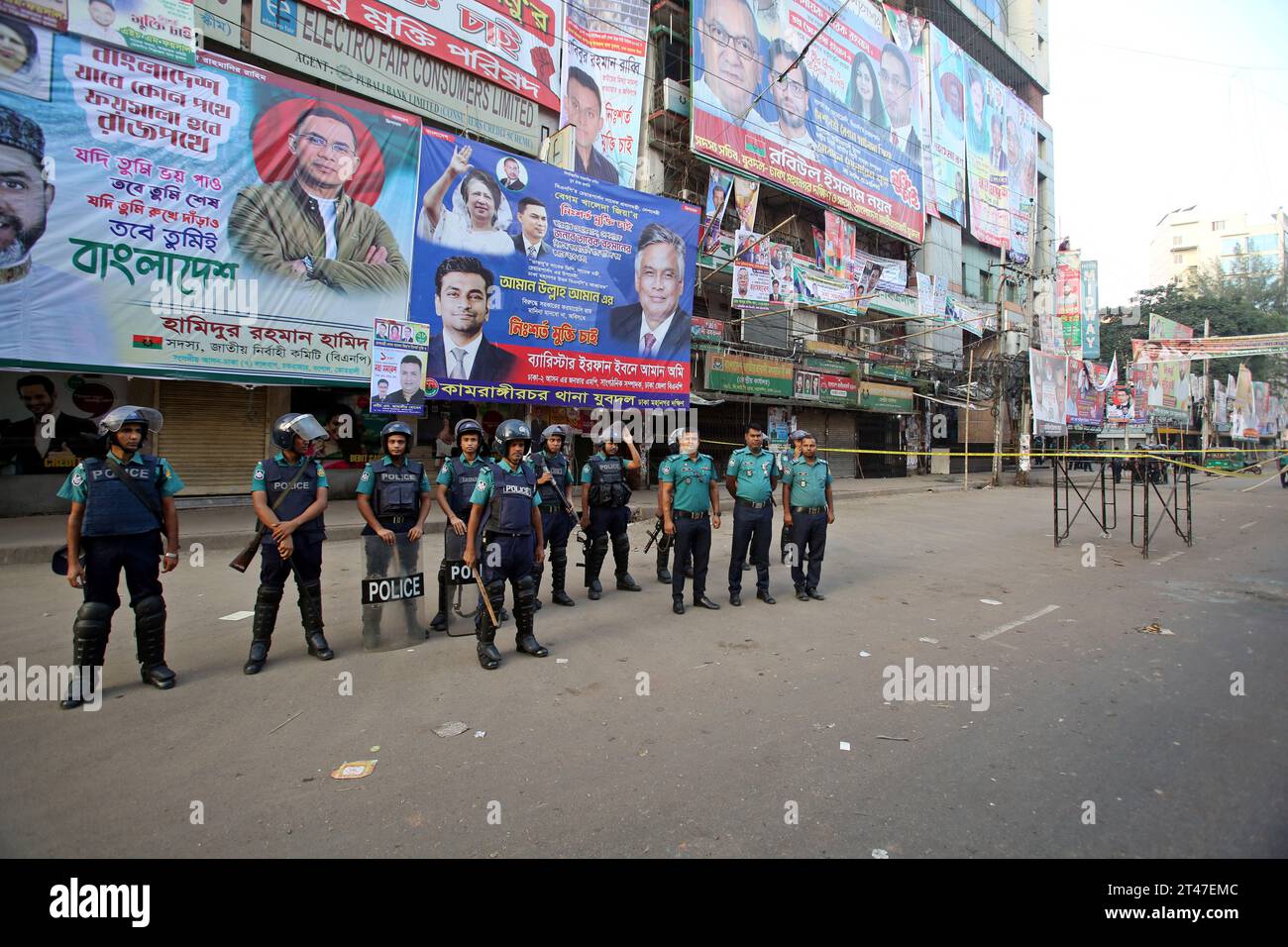 Bangladesh's Criminal Investigation Department (CID) unit gather along a street as they inspect a protest site after Bangladesh Nationalist party (BNP) activists held a rally amid the ongoing nationwide strike in Dhaka on October 29, 2023. More than 100,000 supporters of two major Bangladesh opposition parties rallied on October 28, to demand Prime Minister Sheikh Hasina step down to allow a free and fair vote under a neutral government. Both BNP and Jamaat-e-Islami called for a nationwide strike on October 29, 2023, to protest the violence. Photo by Habibur Rahman/ABACAPRESS.COM Stock Photo
