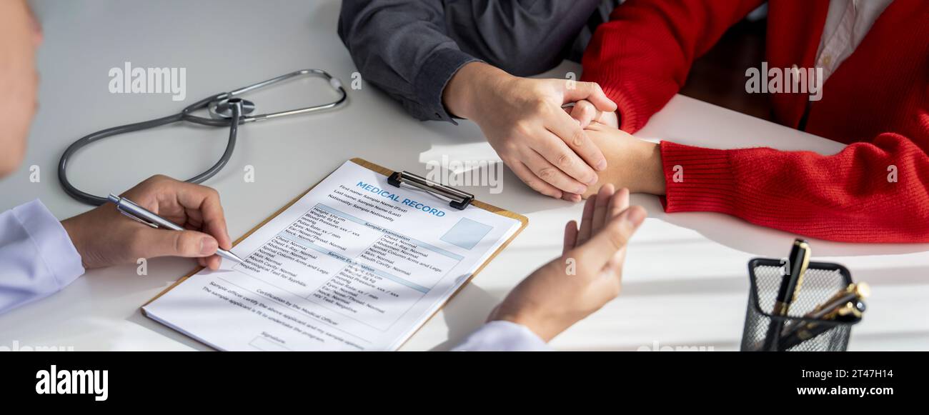 Couple attend fertility or medical consultation with gynecologist at hospital as family planning