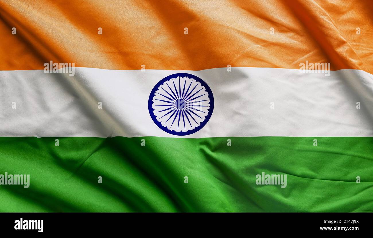 Close up realistic texture fabric textile silk satin flag of India waving fluttering background. National symbol of the country. 15th of August, Happy Stock Photo