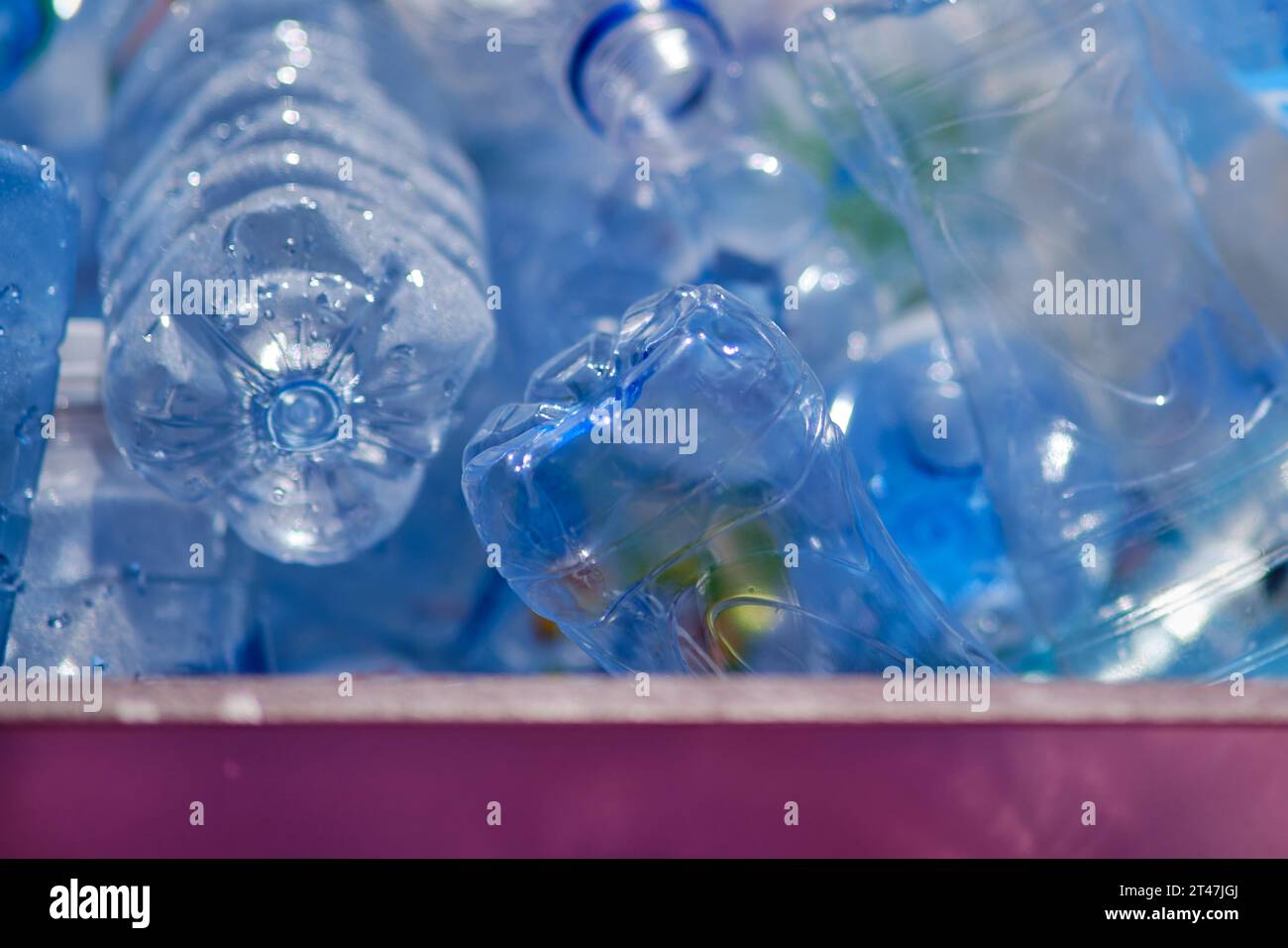 Plastic bottles of water are stored in a recycling center Stock Photo