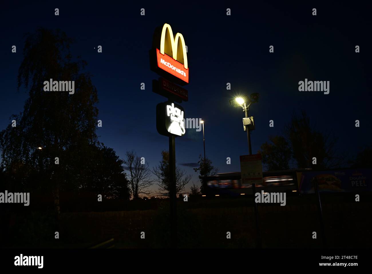 McDonalds sign at night Stock Photo - Alamy