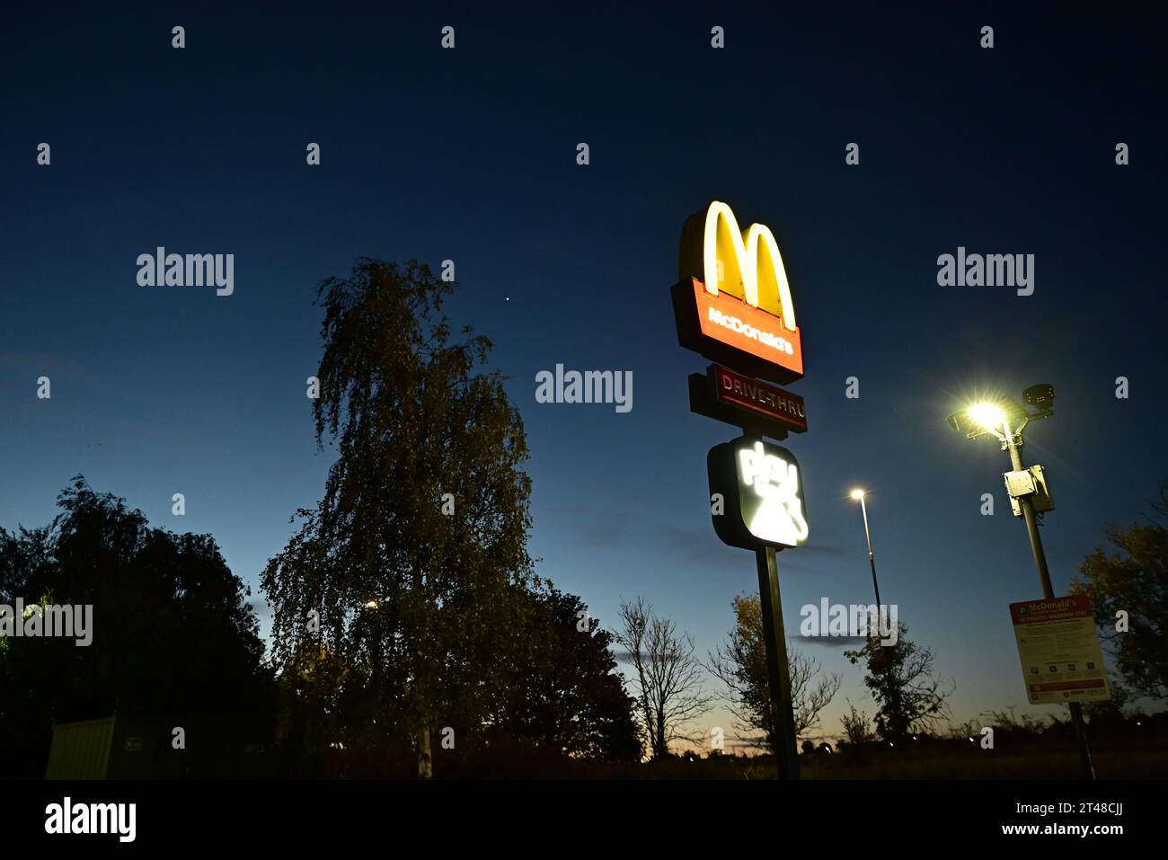 McDonalds sign at night Stock Photo - Alamy