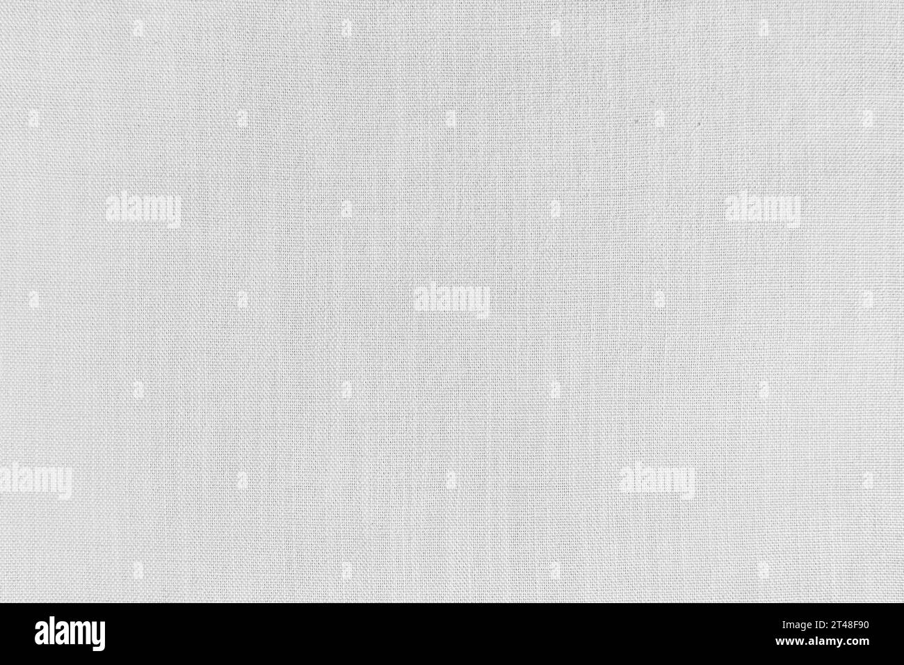 Texture background of white linen fabric. Textile structure, cloth surface, weaving of natural cotton fabric closeup, backdrop, wallpaper. Stock Photo