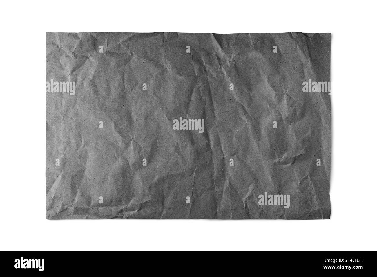 Black crumpled rectangle sheet of paper with smooth edge isolated on white background. Recycled craft paper wrinkled, creased texture, grunge border. Stock Photo