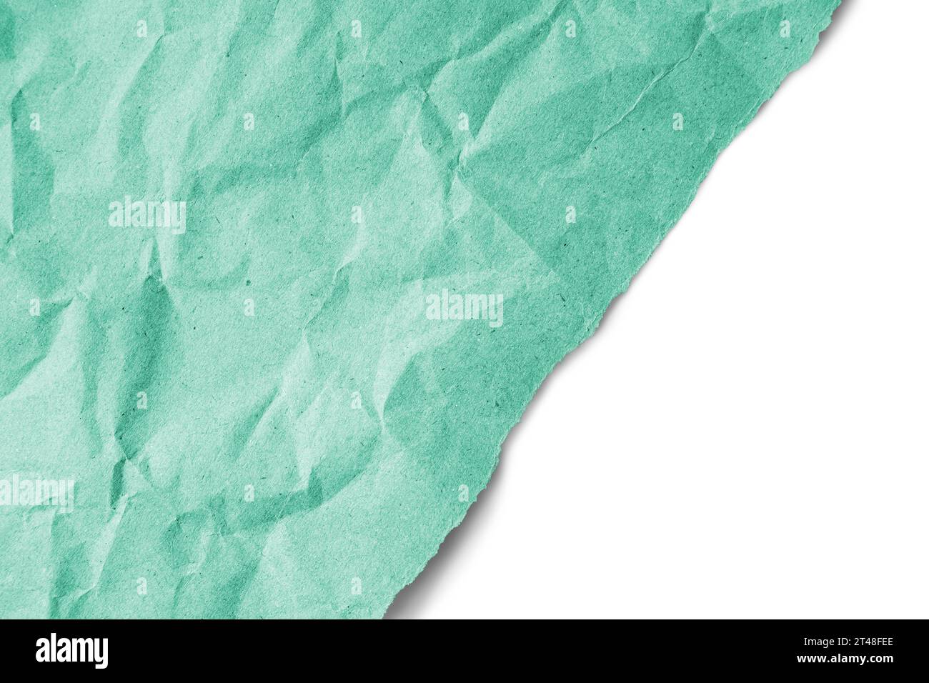 Recycled crumpled turquoise paper texture with a diagonal torn edge ...