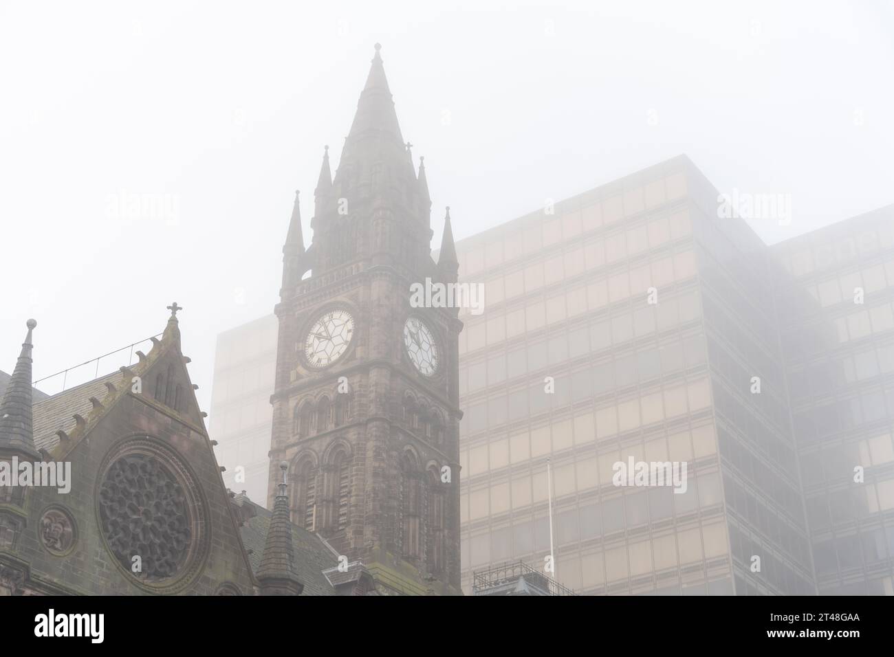 The clock tower of Middlesbrough Town Hall and the high rise Centre North East building - contrasting architecture in Middlesbrough, UK Stock Photo