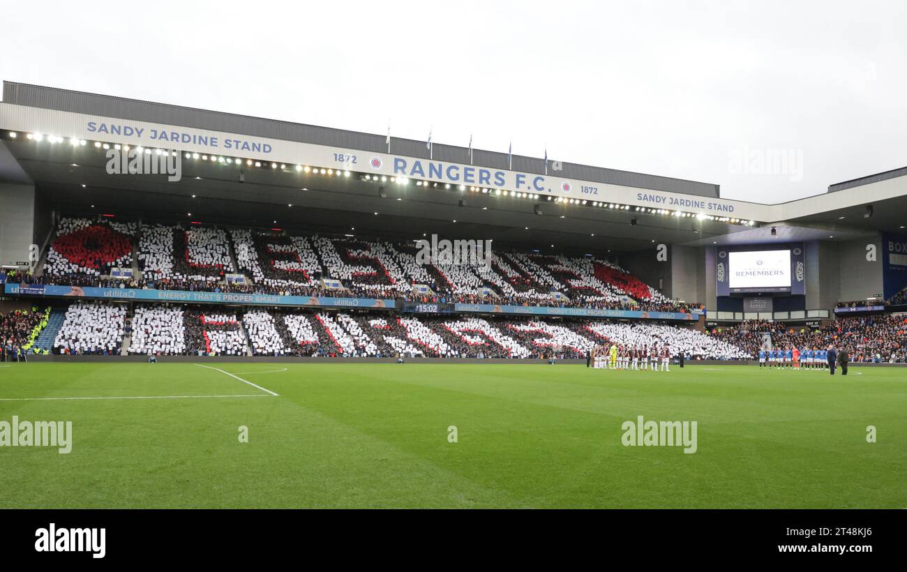 Rangers fans hold up banners reading Lest We Forget ahead of the cinch ...